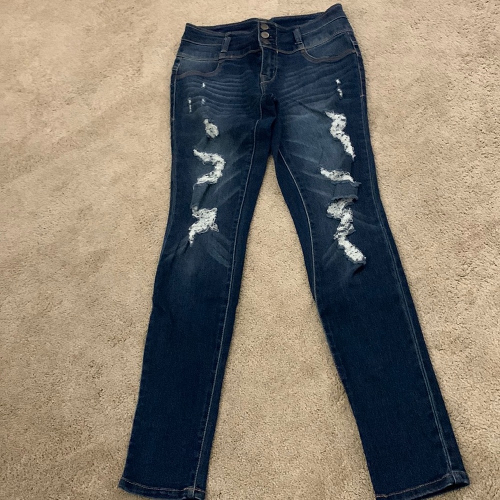 Women’s distressed ripped jeans